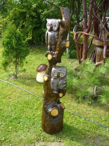 Филин с совой,на дереве.